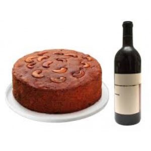 Plum Cake With Red Wine Bottle