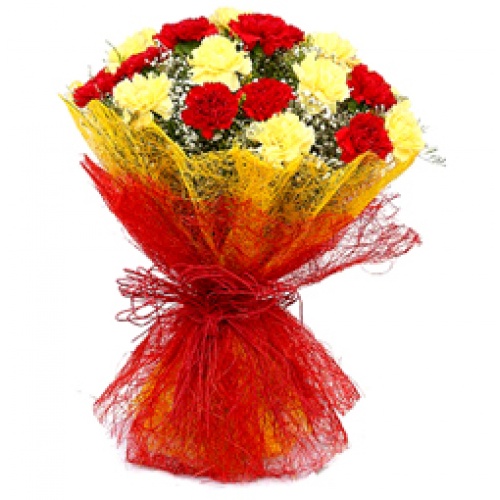 15 red & yellow carnations in jute packing