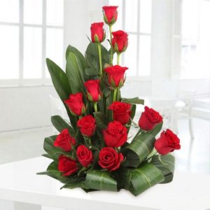 20 red roses in basket
