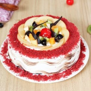 Red velvet cake with fruit topping